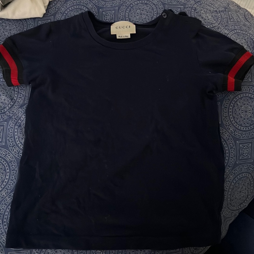 Size 4t authentic Gucci shirt. Great condition!!